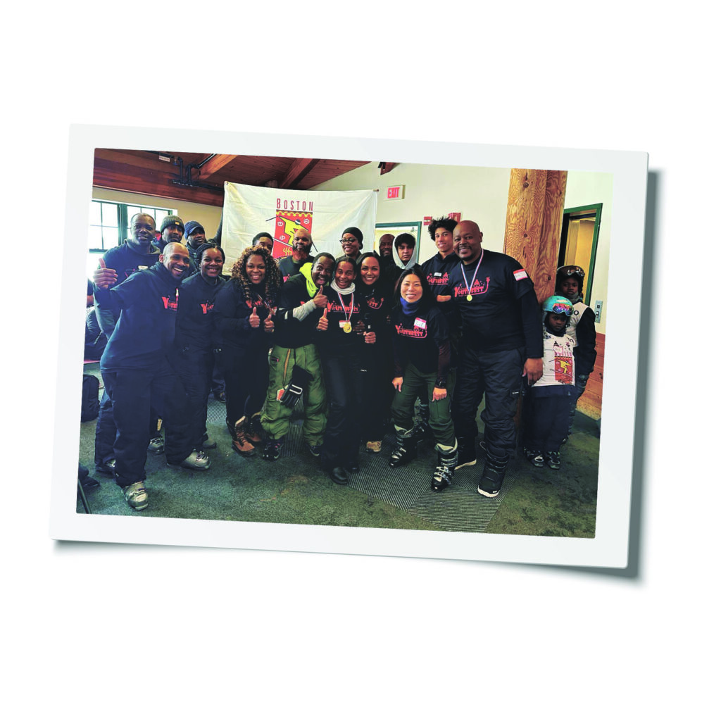 Group of Black ski club members celebrating with medals, promoting inclusivity in winter sports, Boston ski community event.